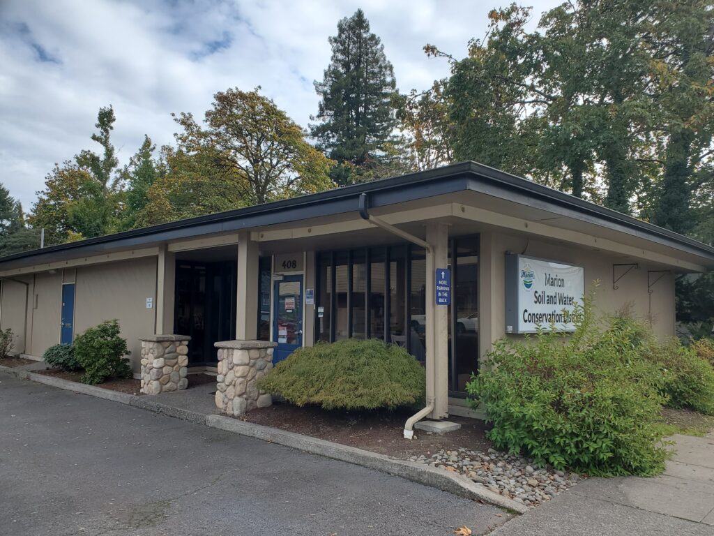 Front view of Stayton office building showing roof, front door, and large MSWCD sign facing 3rd Ave.