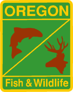 a green vertical rectangle with the words Oregon at top and Fish & Wildlife at bottom in yellow and a brown fish and deer silhouette in center