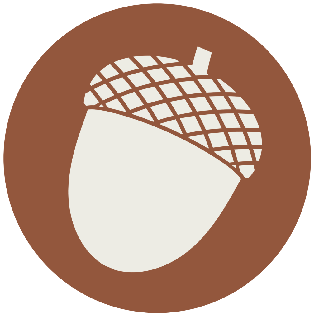 an acorn silhouette on a brown circle background