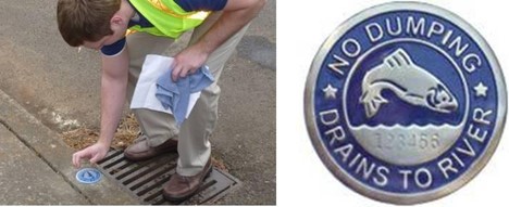 City worker reaching for a circular metal sign embedded in the curb by a stormdrain and a close up of the sign which shows a fish jumping and says, "No Dumping Drains to River."