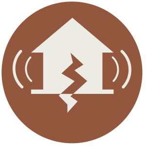 a brown circle icon with an off-white house with a crack in it that goes into the ground and shake lines on its sides